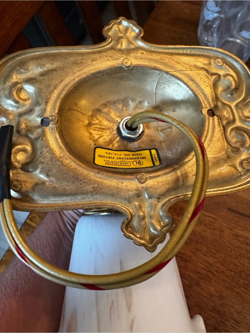 Vintage Brass Wall Sconce with Frosted Swirl Glass Shade
